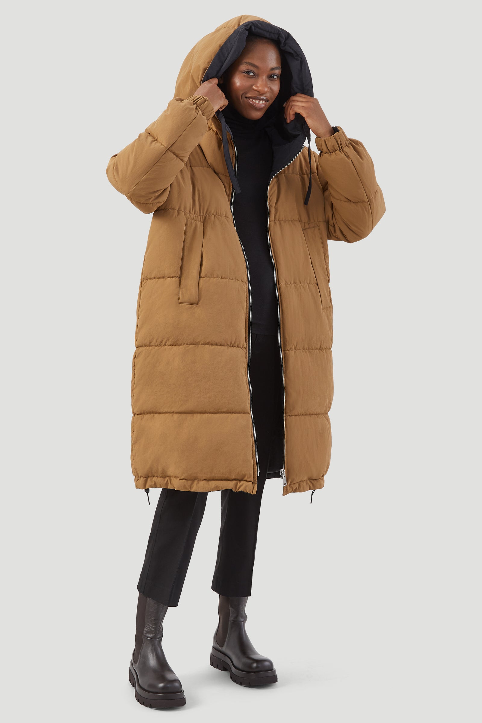 Long black padded coat with belt best sale